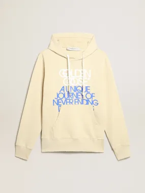 Marzipan-colored sweatshirt with lettering on the front